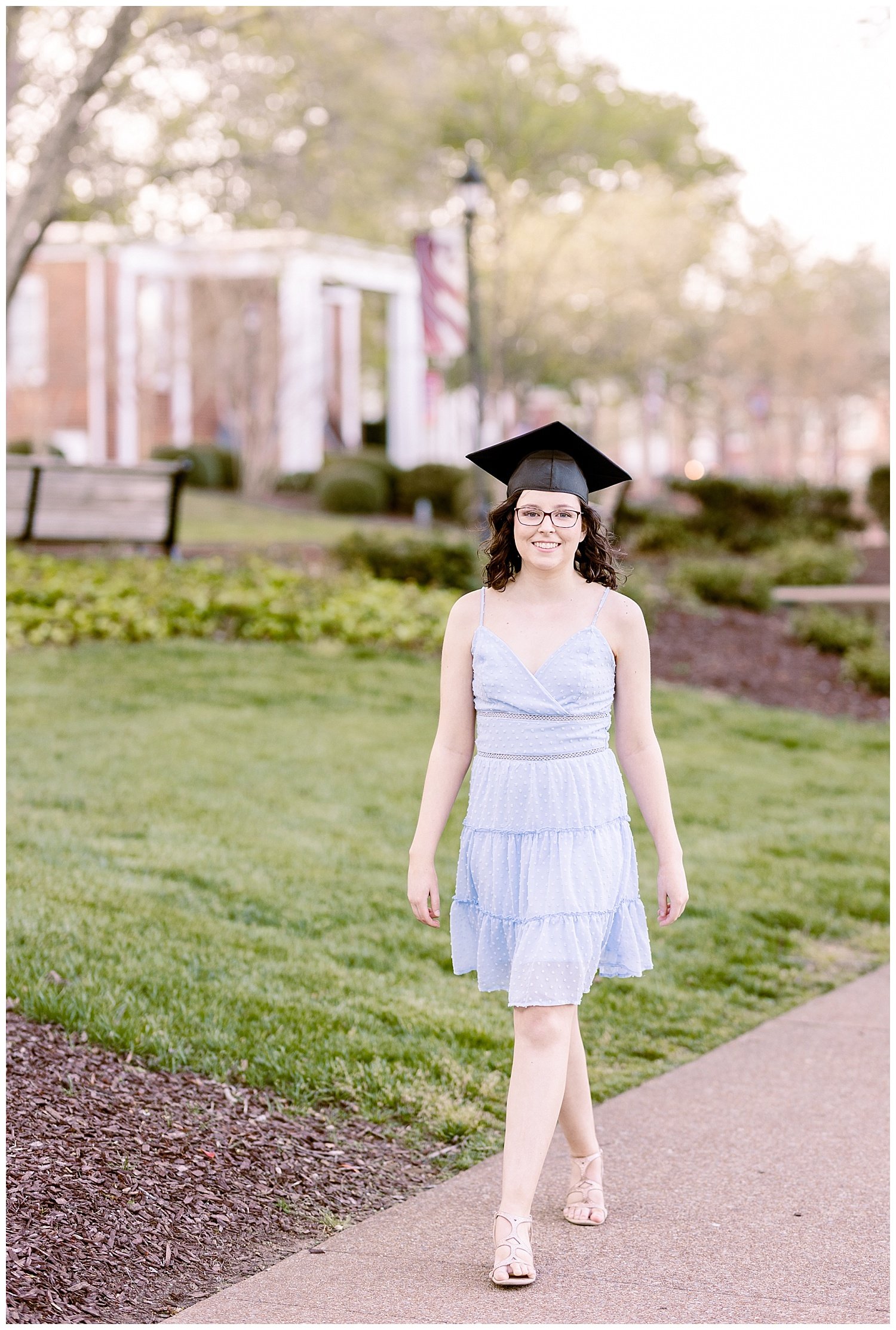 college girl wearing a graduation cap and walking