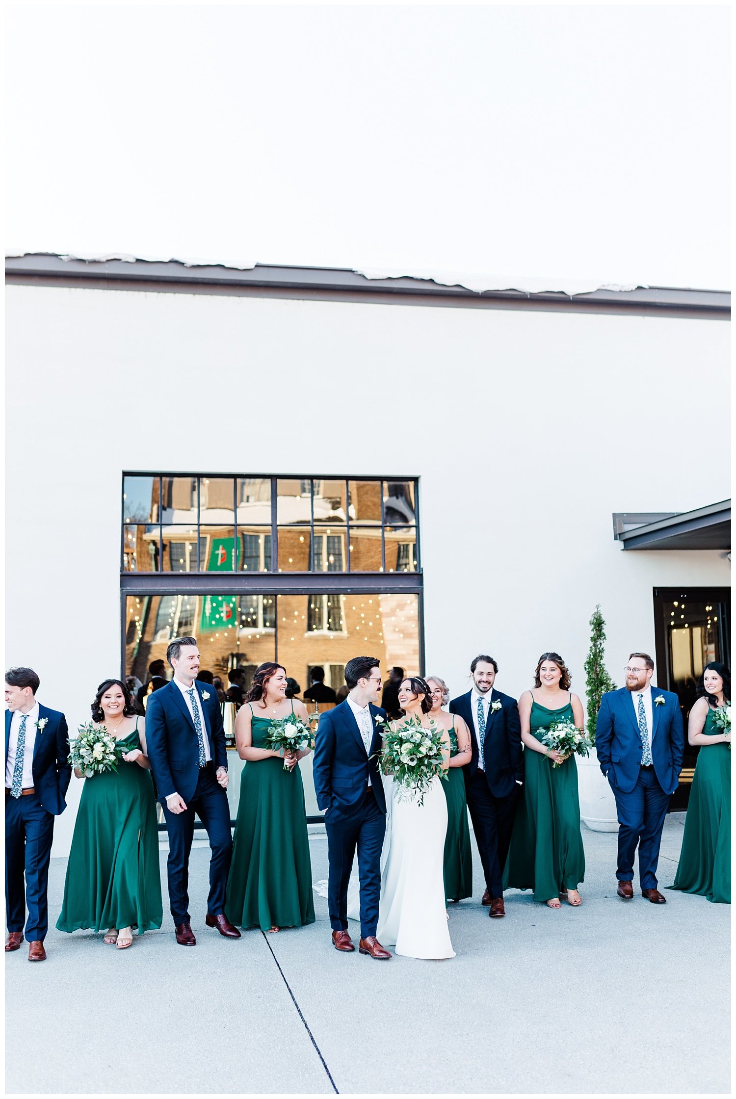 bridal party walking together outside