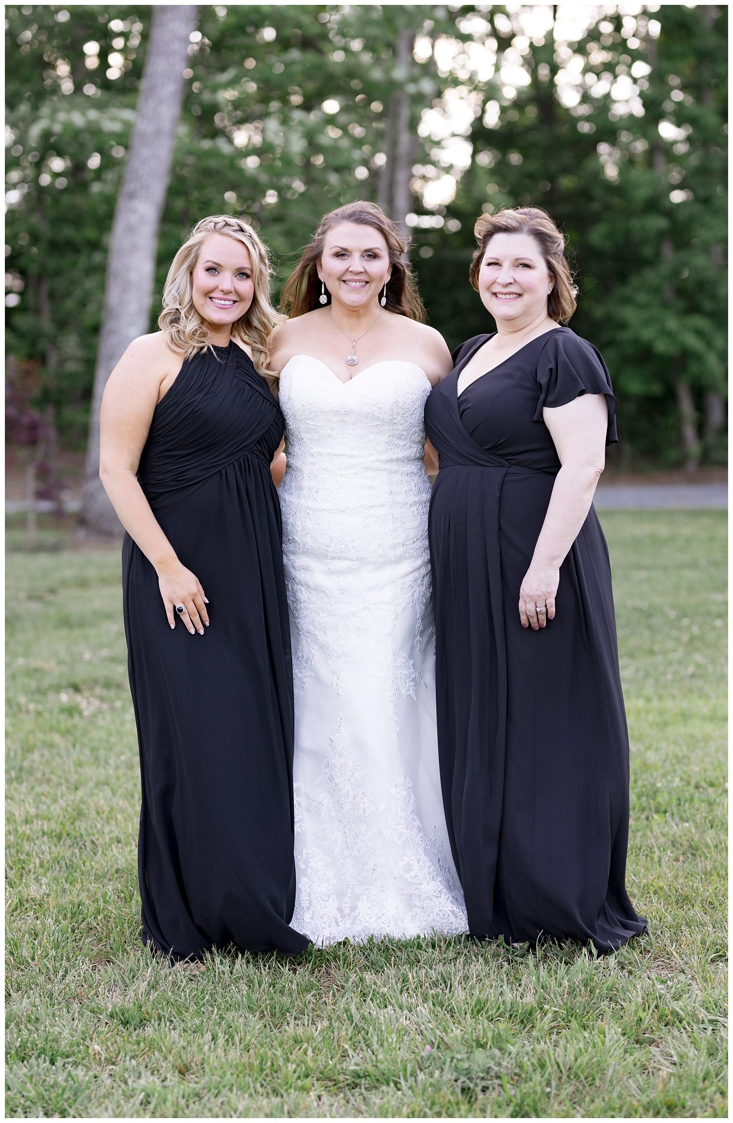 bride posing with bridesmaids at Chattanooga wedding