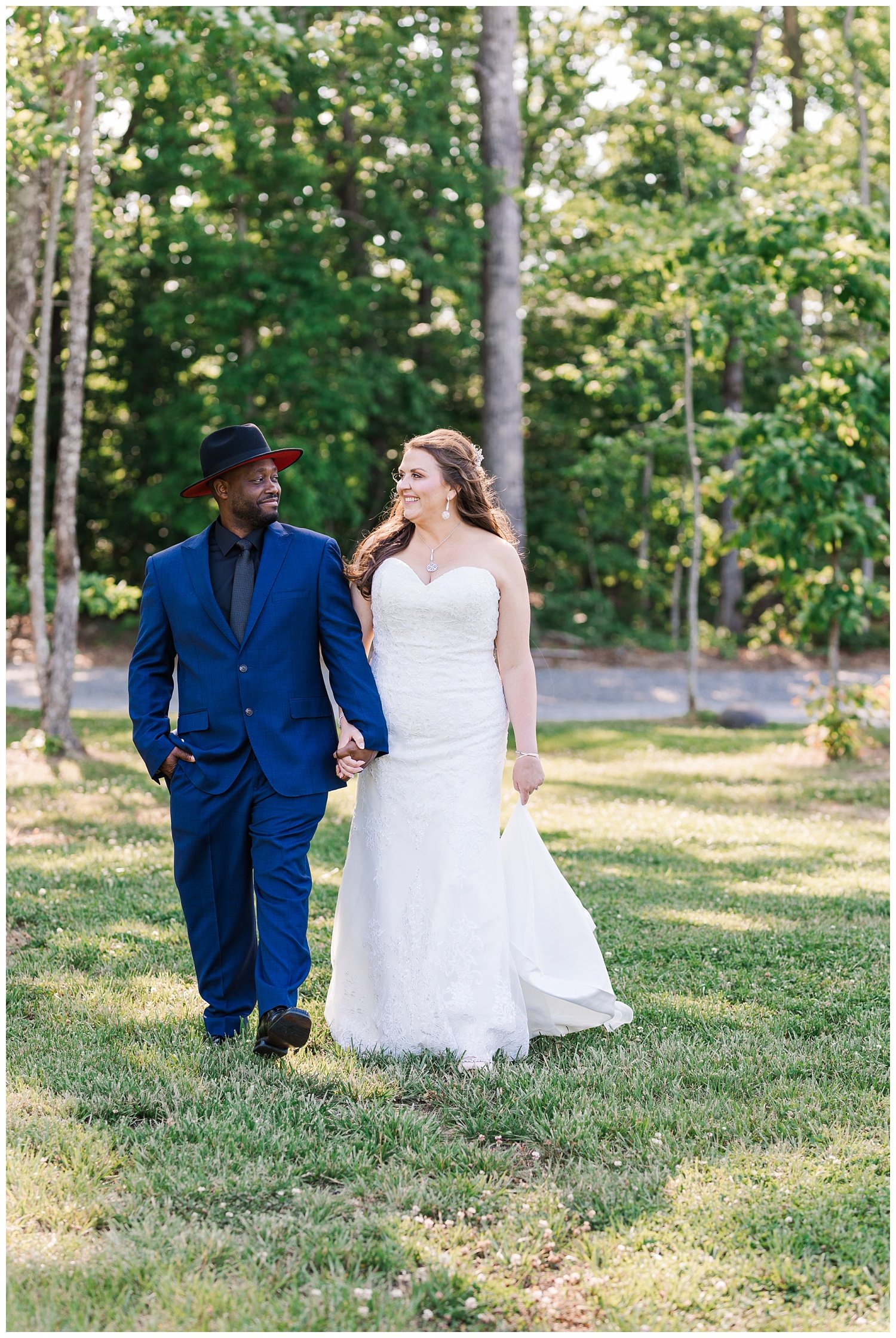 bride and groom walking together at Mountain Heights Venue