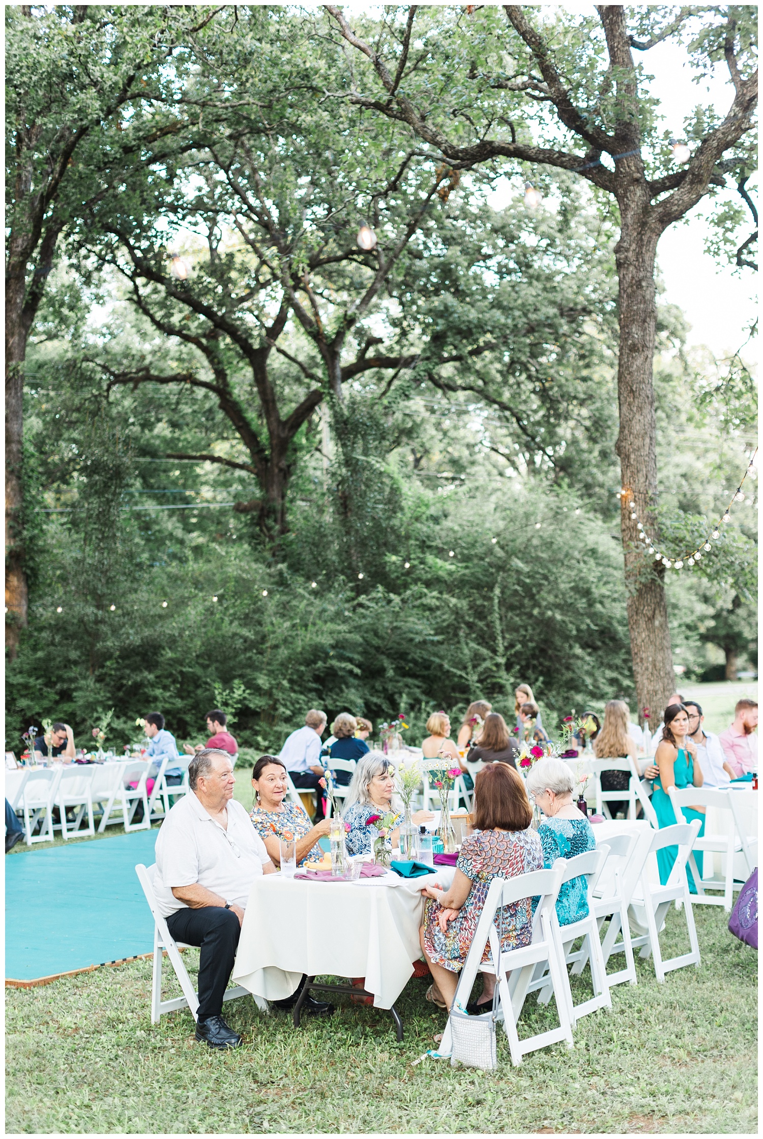 wedding guests sitting at outdoor reception in Chattanooga