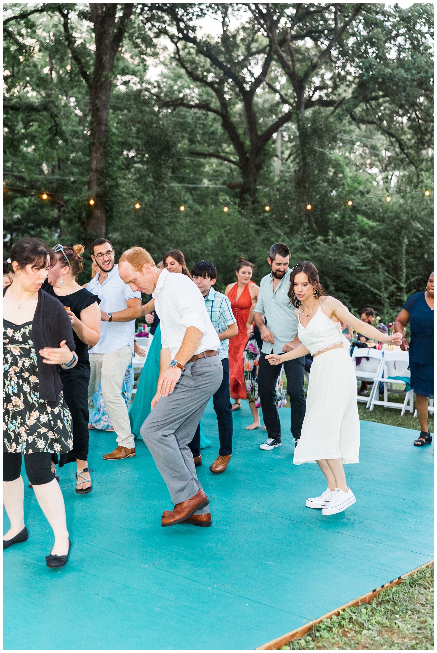 wedding guests dancing at summer reception in Chattanooga