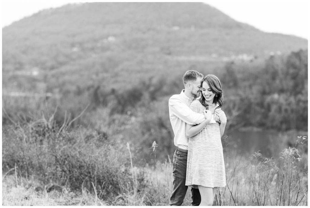 couple hugging at winter engagement session in Chattanooga