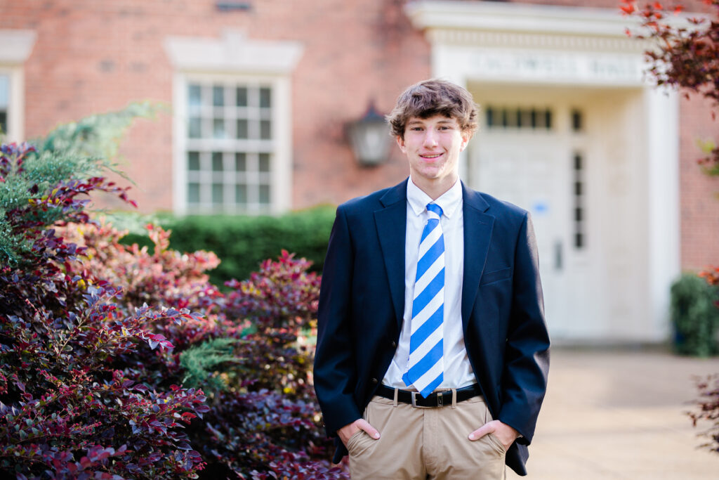 high school boy posing for photos at McCallie School in Chattanooga