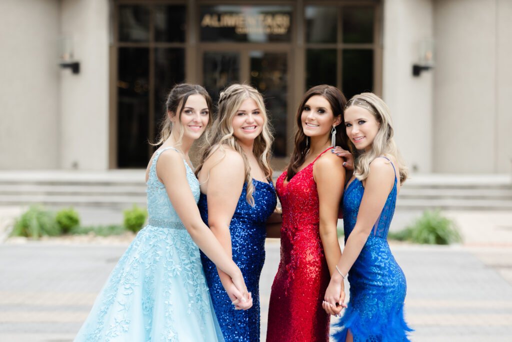 group of girls posing for prom photos in Chattanooga
