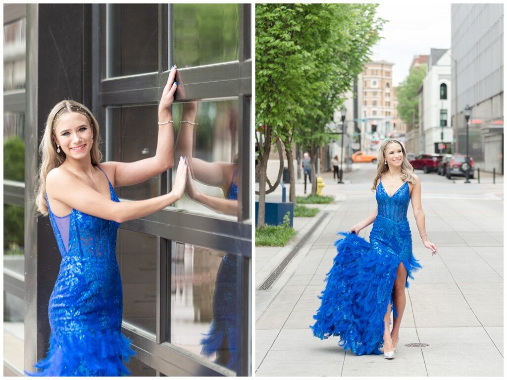 girl walking down the street wearing a blue prom dress