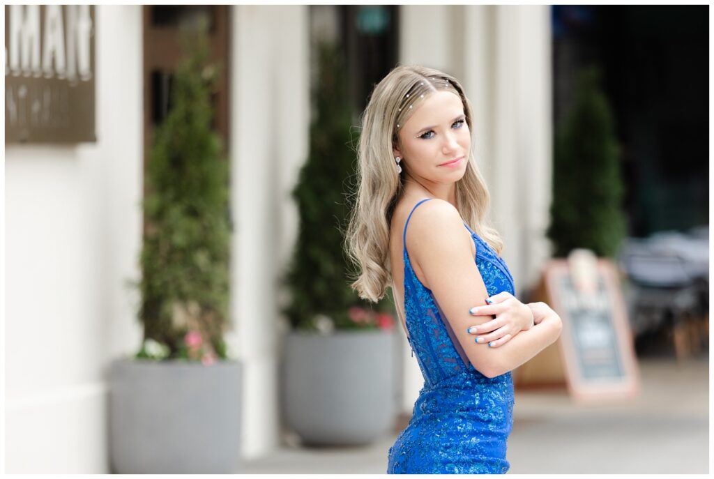 girl wearing a blue dress for prom photos in West Village