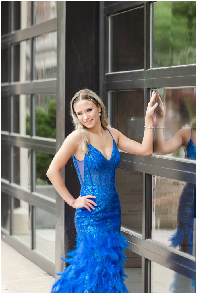 girl leaning against a door at downtown Chattanooga prom session