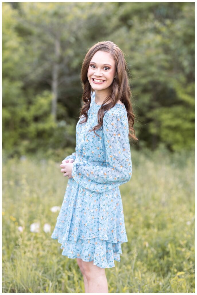 Chattanooga high school senior wearing a blue and white flower dress