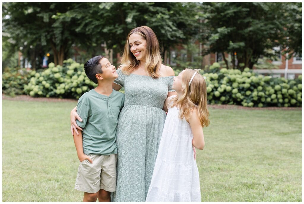 mom hugging her children at family shoot in Cleveland, TN