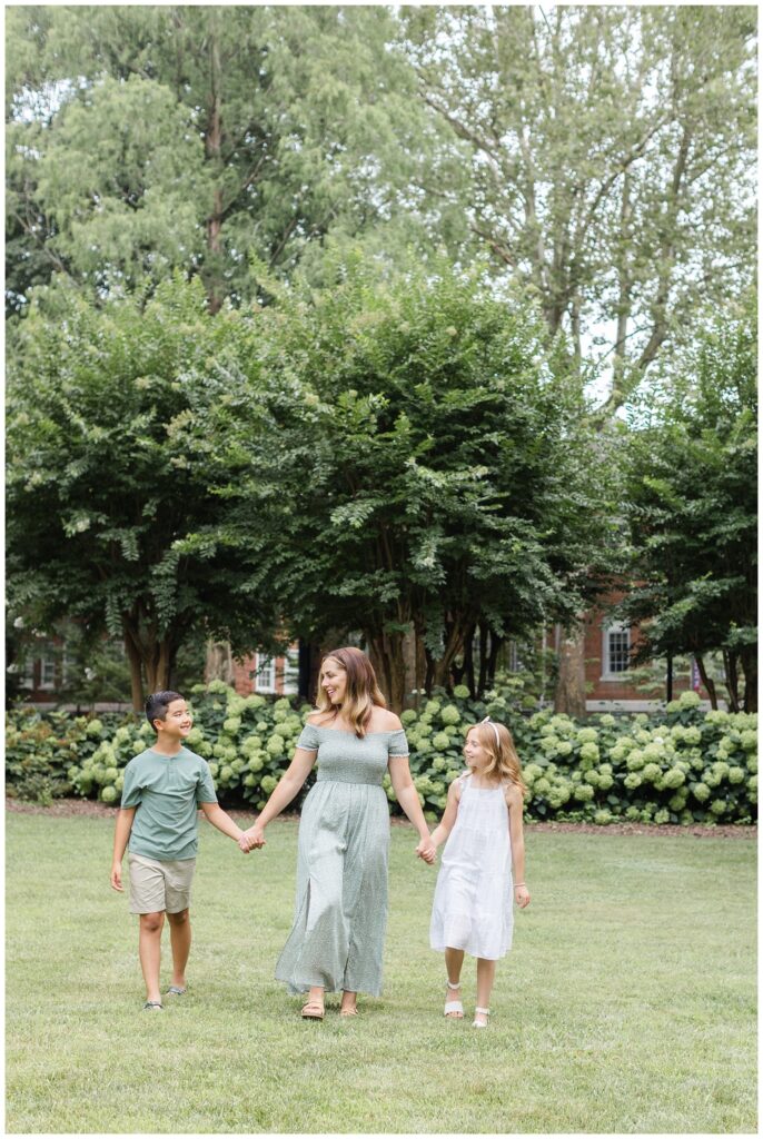 mom walking with her kids at summer session