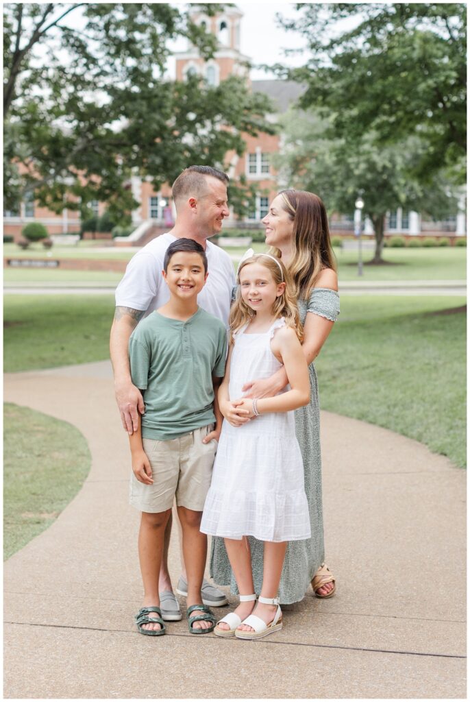 family holding each other at photo shoot in Cleveland, TN
