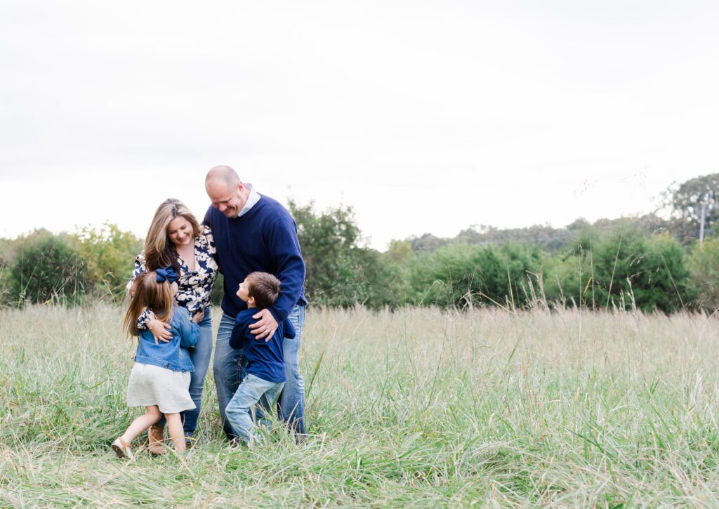 family hugging at a mini session in Chattanooga