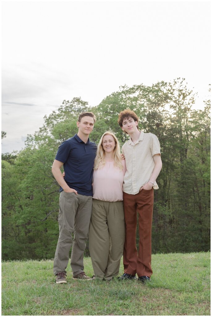 mom embracing her two sons at extended family session in Chattanooga