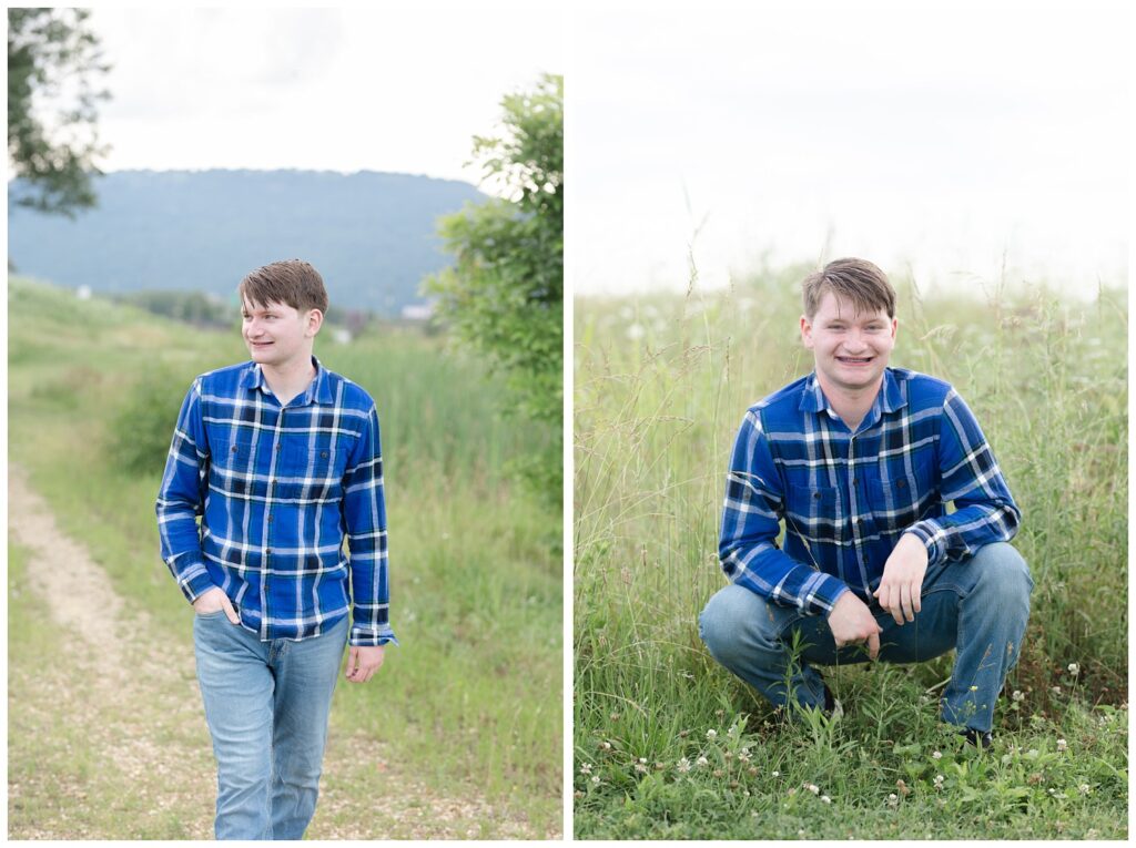 senior boy kneeling in the grass at downtown Chattanooga session