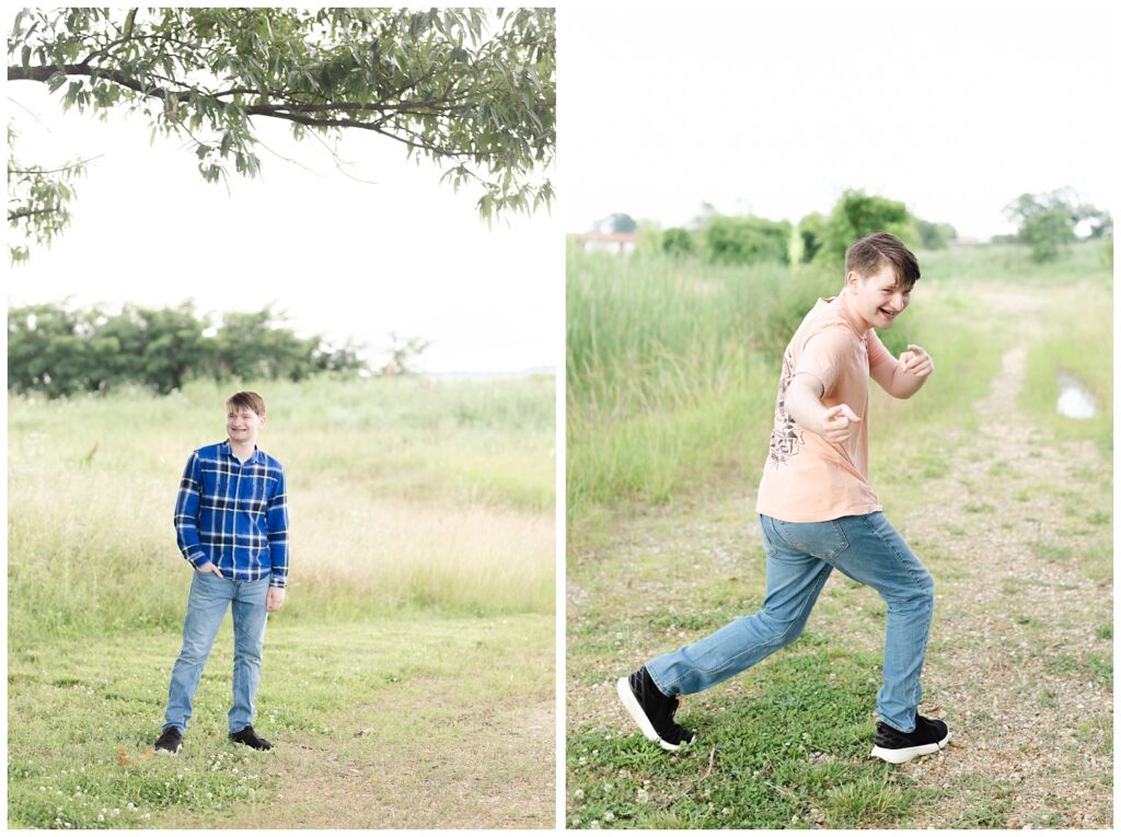 high school senior pointing to the camera while posing on a trail at Sculpture Fields