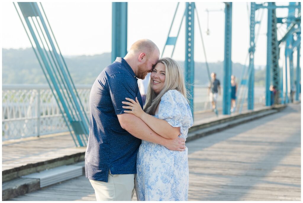 Chattanooga proposal photographer with a couple on the Walnut Street Bridge