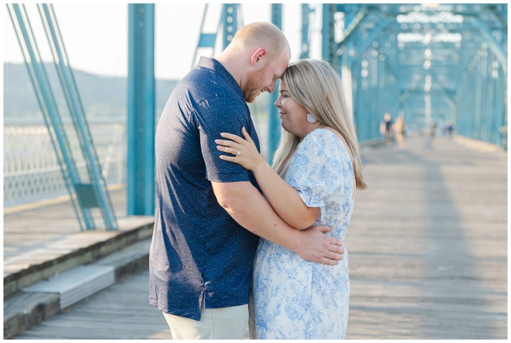 engagement couple posing together on the Walnut Street Bridge