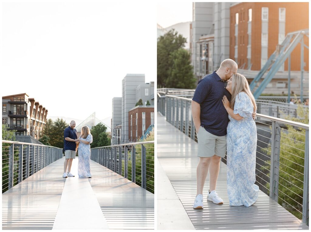 couple holding each other and laughing at downtown Chattanooga engagement