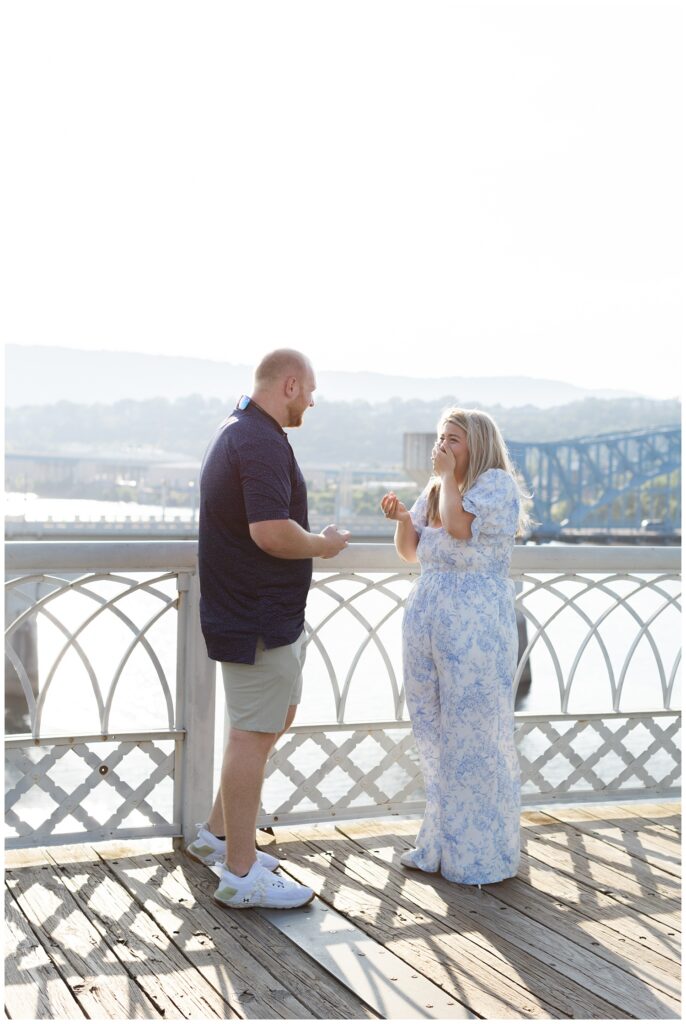 girlfriend surprised by man proposing to her in Chattanooga on the Walnut Street Bridge