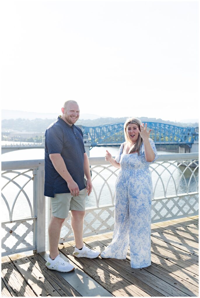 girl showing off her engagement ring on the Walnut Street Bridge