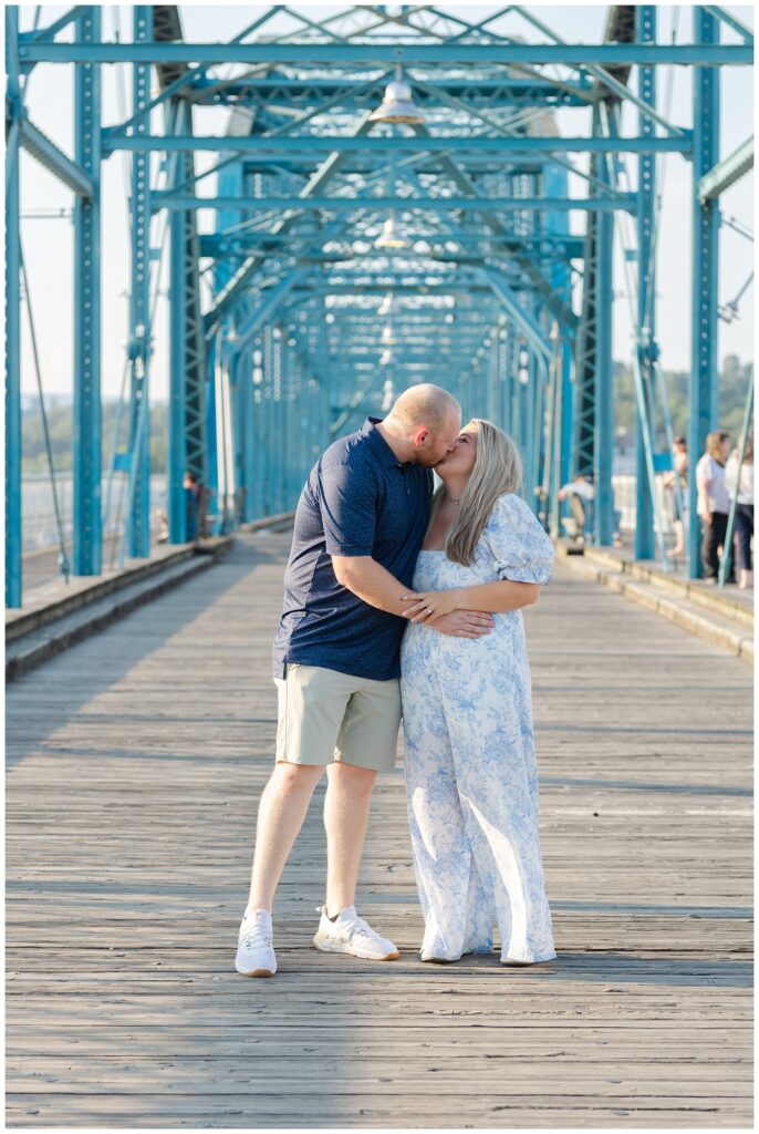 couple kissing on the Walnut Street Bridge after proposal