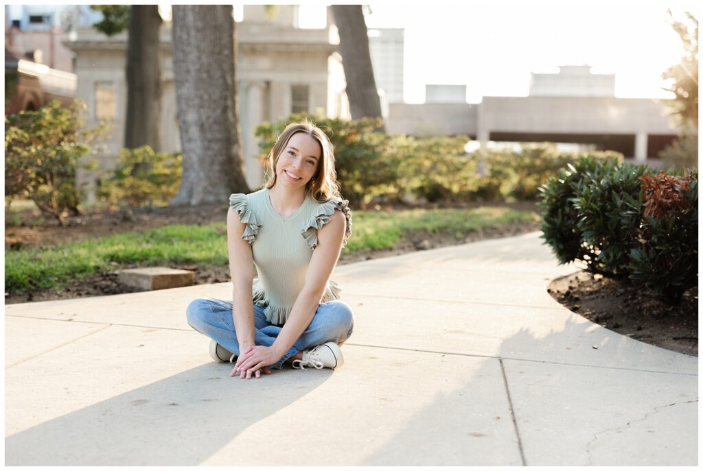 girl sitting on a sidewalk for summer Chattanooga senior session