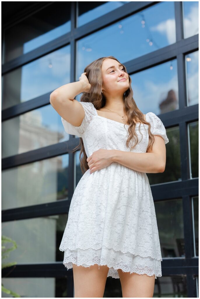 girl posing next to a large garage door in downtown Chattanooga