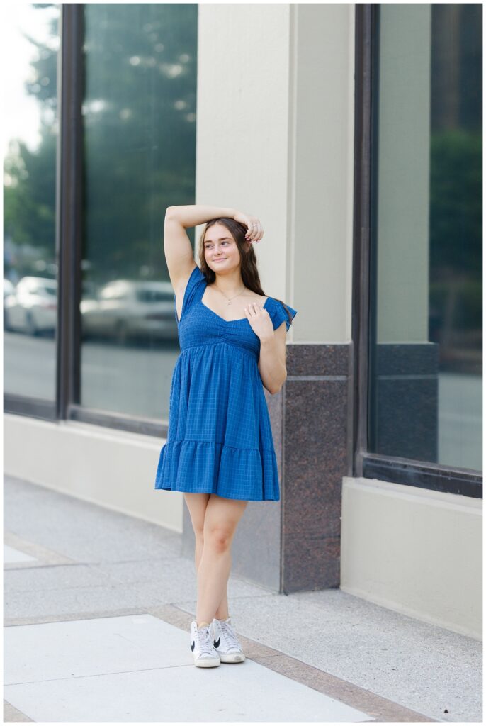 downtown Chattanooga senior session with girl wearing a short blue dress 