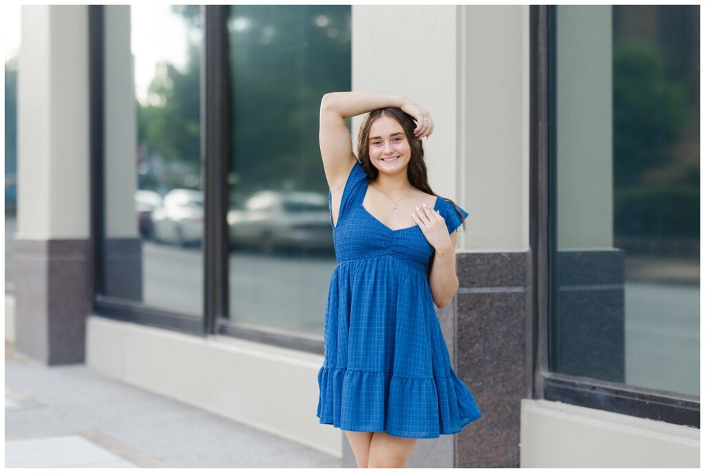 downtown Chattanooga senior session with girl wearing a short blue dress 