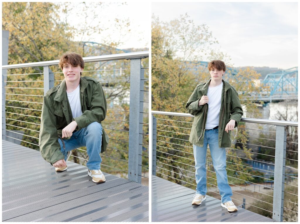 senior boy holding his green jacket and wearing jeans for Chattanooga session