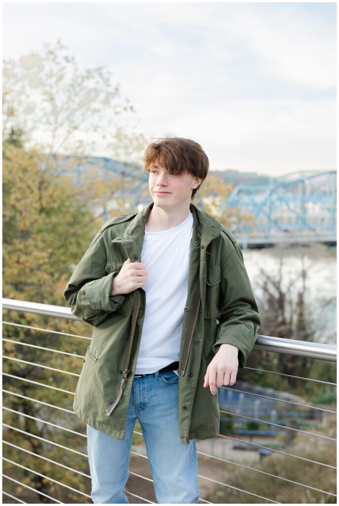 Chattanooga senior portrait photographer on the steel walking bridge with high school boy