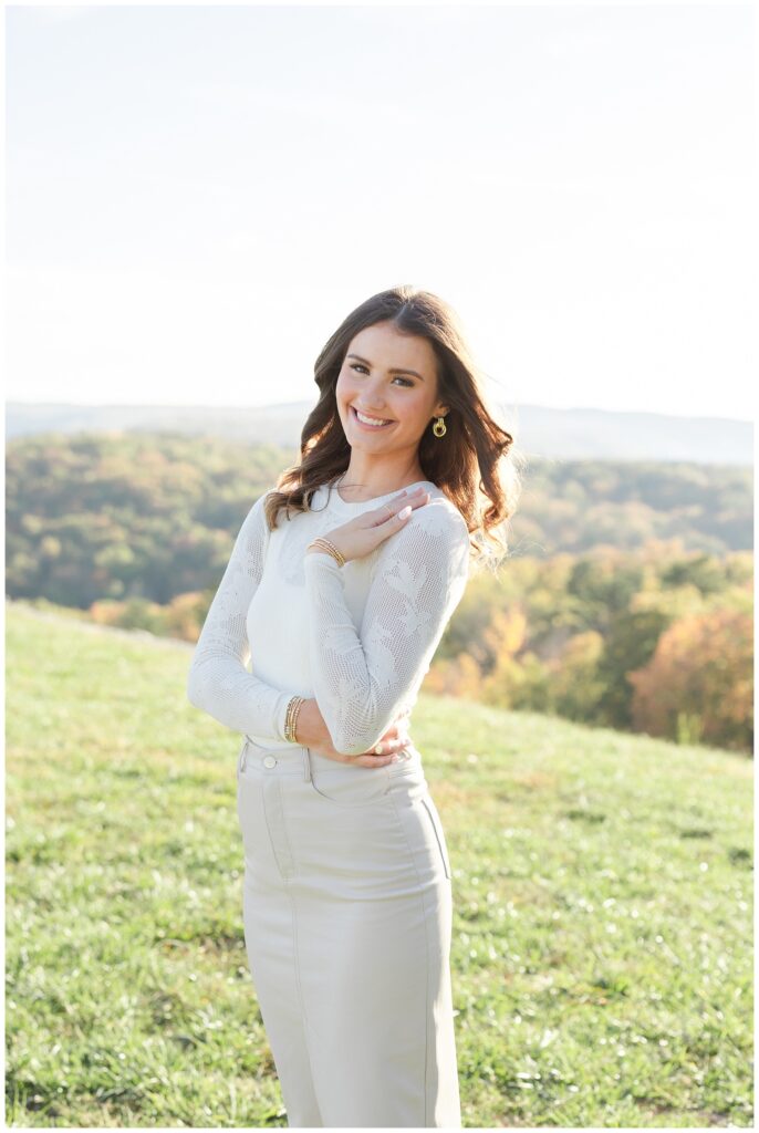 senior girl wearing a leather skirt and lace shirt on Raccoon Mountain