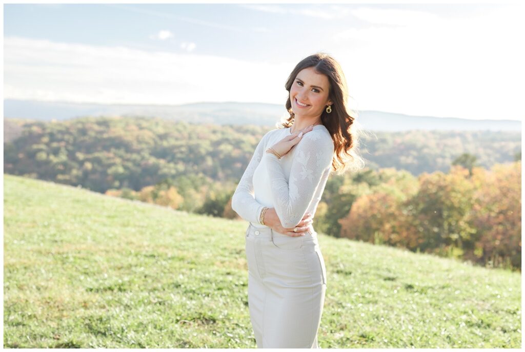 high school senior smiling and posing for Raccoon Mountain photoshoot