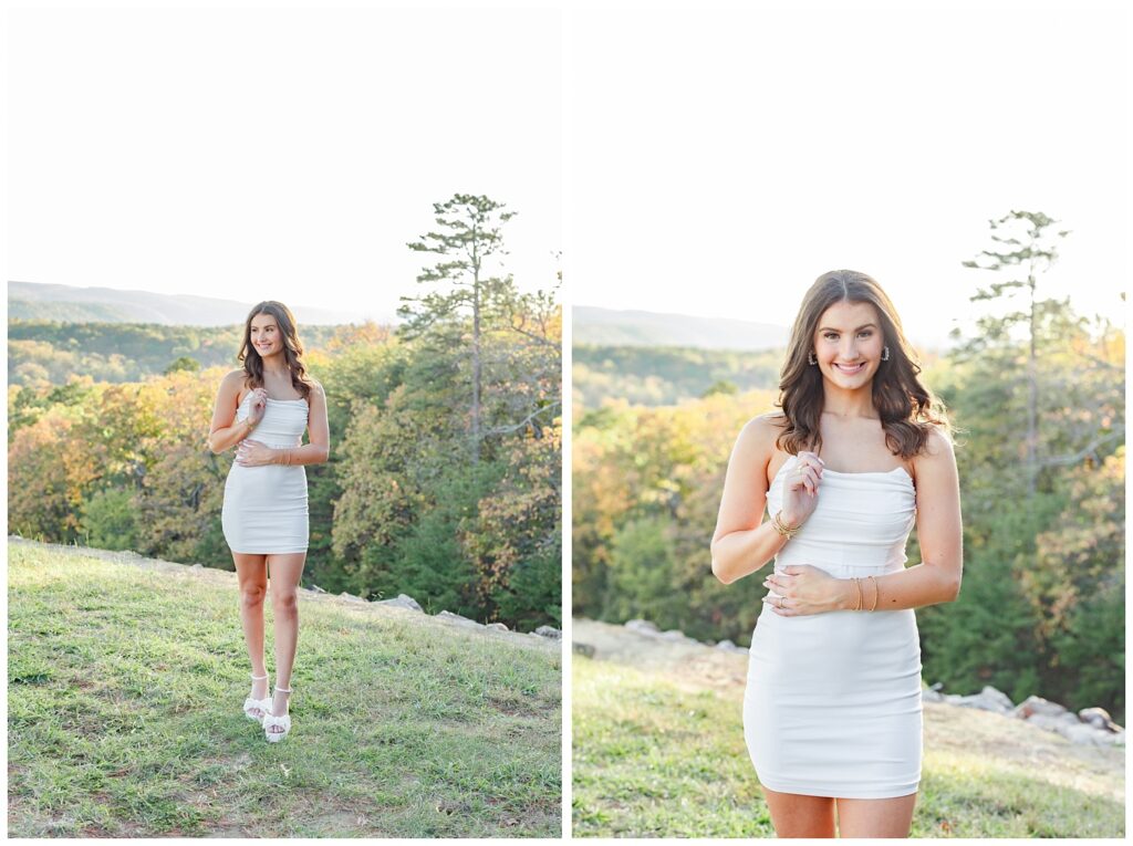 high school senior holding her hair and wearing a white dress on Raccoon Mountain