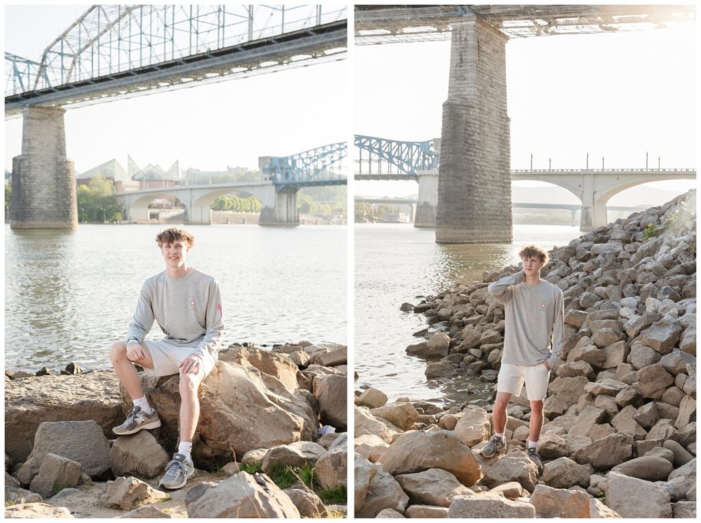 high school senior boy standing on the rocks down by the Tennessee River in Chattanooga