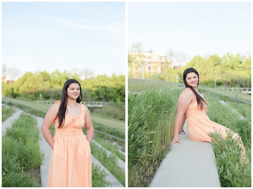 senior girl sitting on a concrete bench around grass in Renaissance Park 