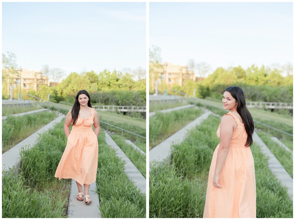 high school senior girl walking along a concrete path in downtown Chattanooga