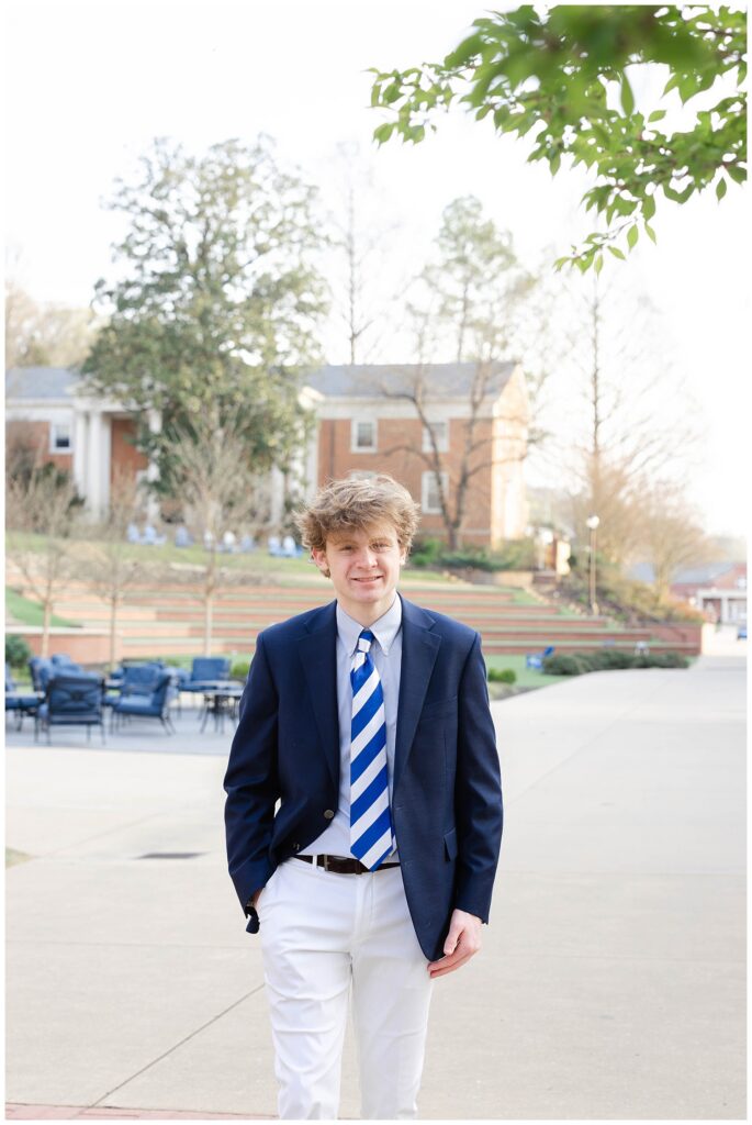 high school senior walking around campus at McCallie School for spring session